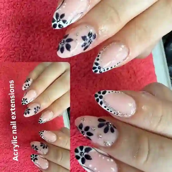 Navy floral nail art with gems